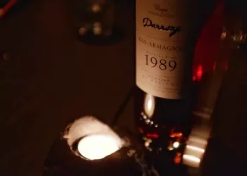 How do you open a wine without a corkscrew