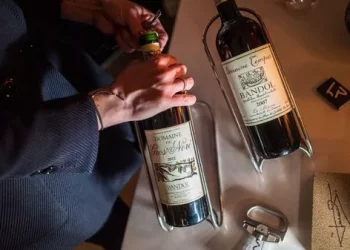 How do you open wine without a corkscrew